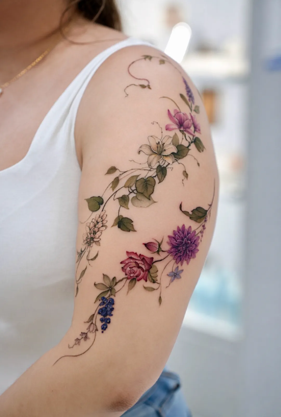 Watercolor tattoo by a Baron Art artist